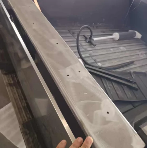 Tesla Roadster 2nd gen Any suggestion of tailgate spare tire mount solution?? 002
