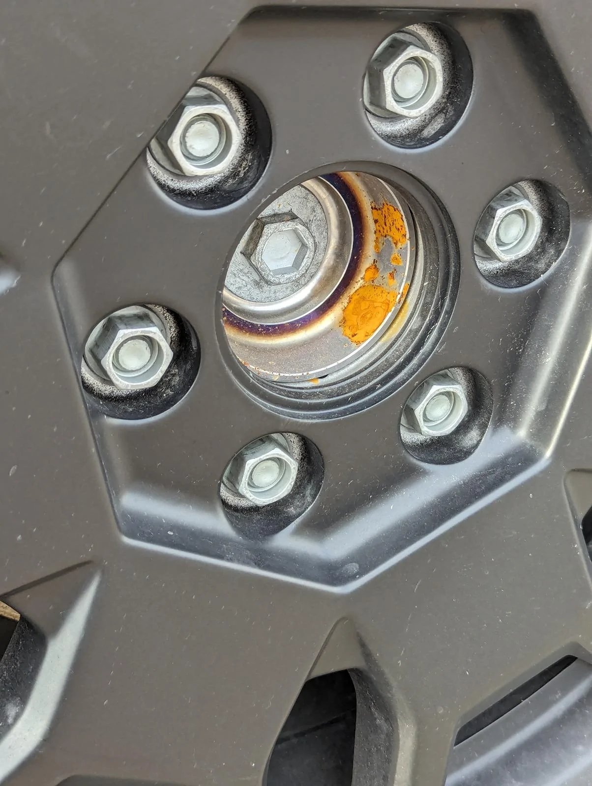 Tesla Roadster 2nd gen Cleaning / Treating Hub Cap Rust? 1000001799
