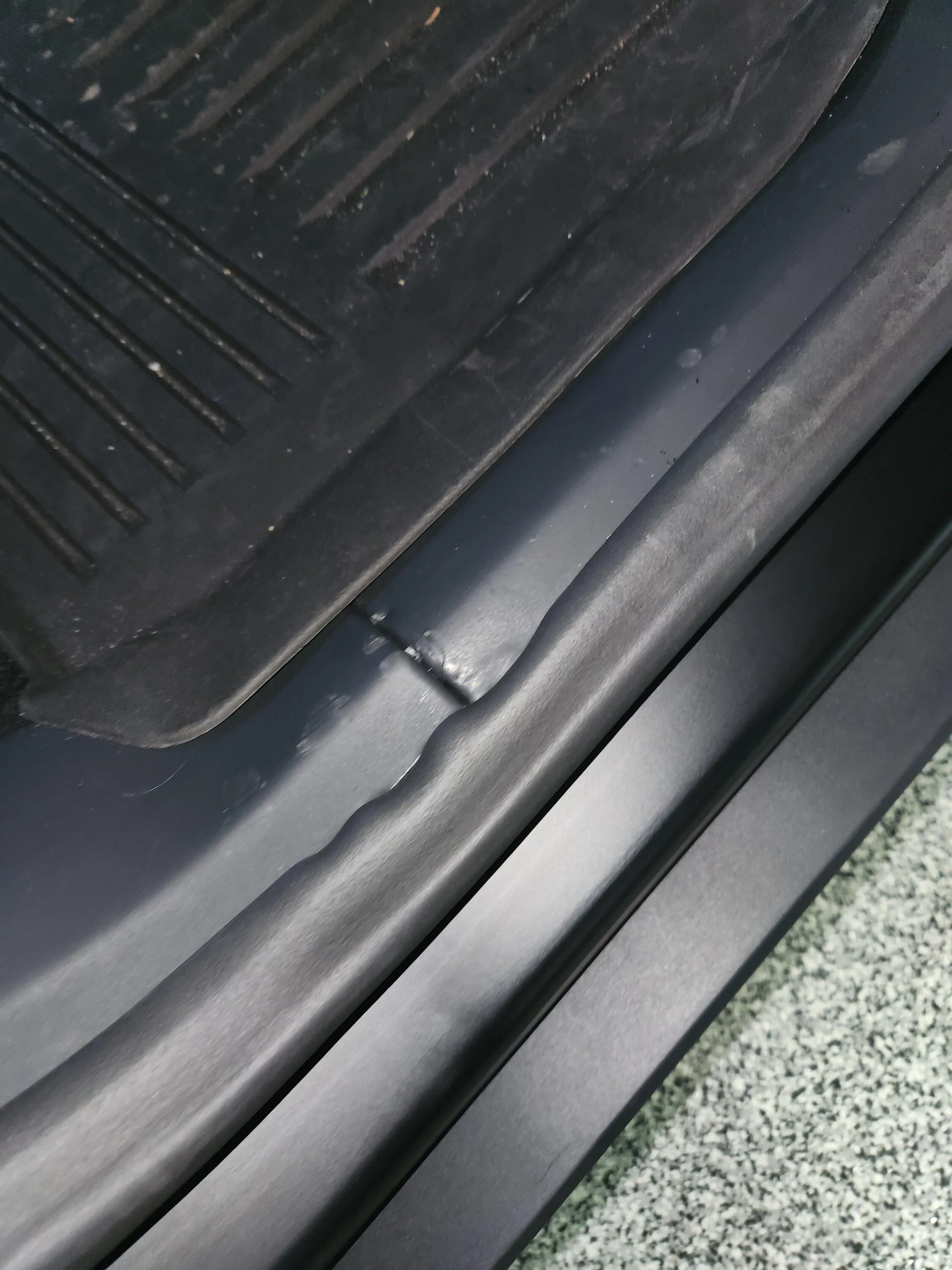 Tesla Roadster 2nd gen Rear passenger interior side sill foam material -- permanent markings / tears 20240514_095610
