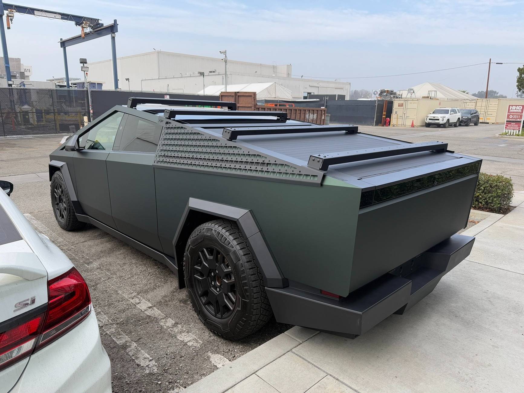Tesla Cybertruck Customer Cybertruck in PURE PPF Forest Green Wrap, Gyeon Ceramic Coat, UP MOLLE Sails and Roof Racks 472785713_10162810059094673_2480002305219307973_n