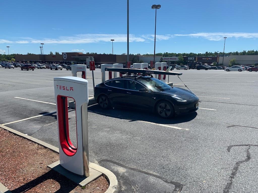 Tesla Cybertruck Charging stations. AF1QipMzygPp-lqRoi89wthh6Hj0F5VIba4zCiqUZpFd=s1024