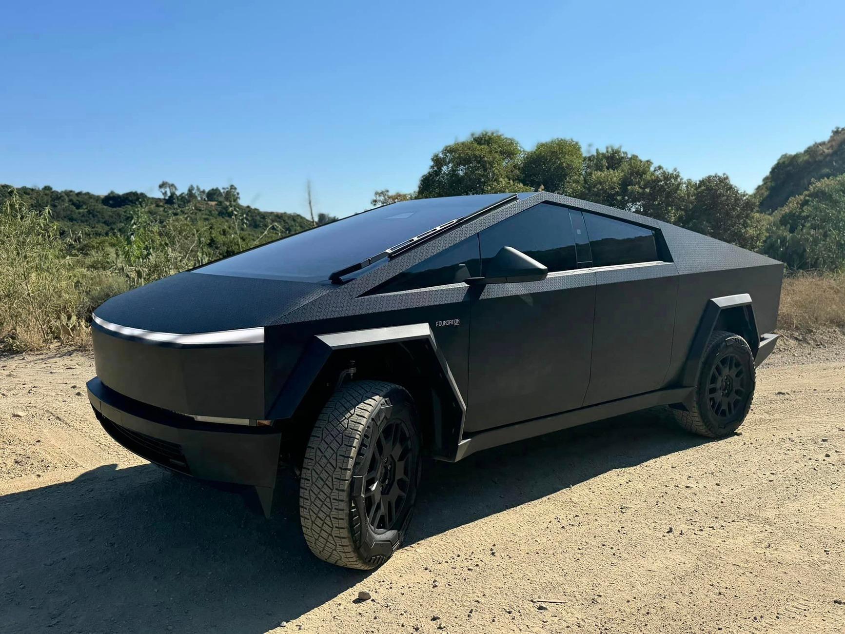Tesla Cybertruck BLACK Vinyl Wrap & PPF Cybertruck -- Photos & Videos Black honeycomb vinyl wrap cybertruck wrap 3