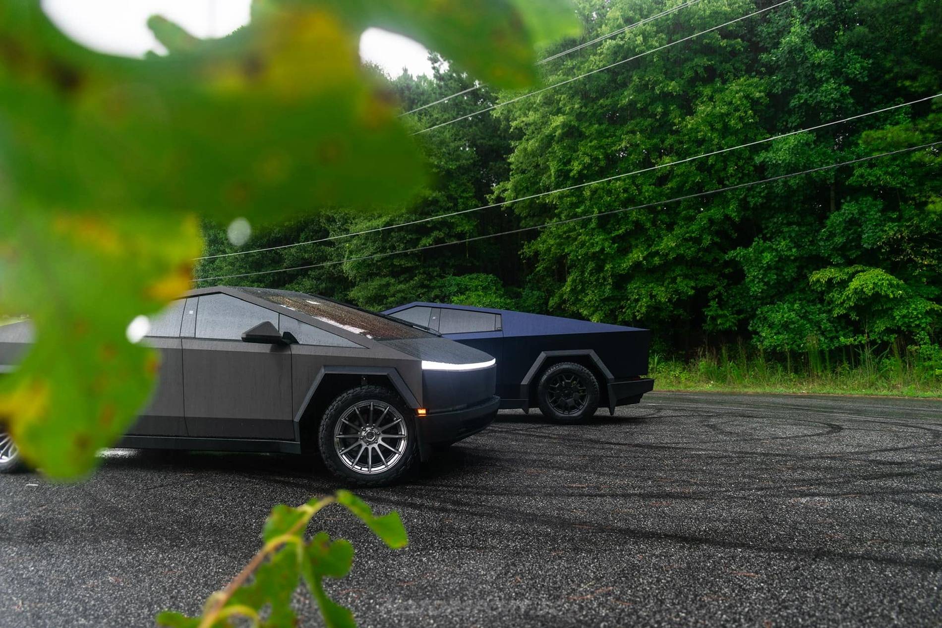 Tesla Cybertruck BLACK Vinyl Wrap & PPF Cybertruck -- Photos & Videos Brushed Black Metallic wrap w: aftermarket polished wheels 1