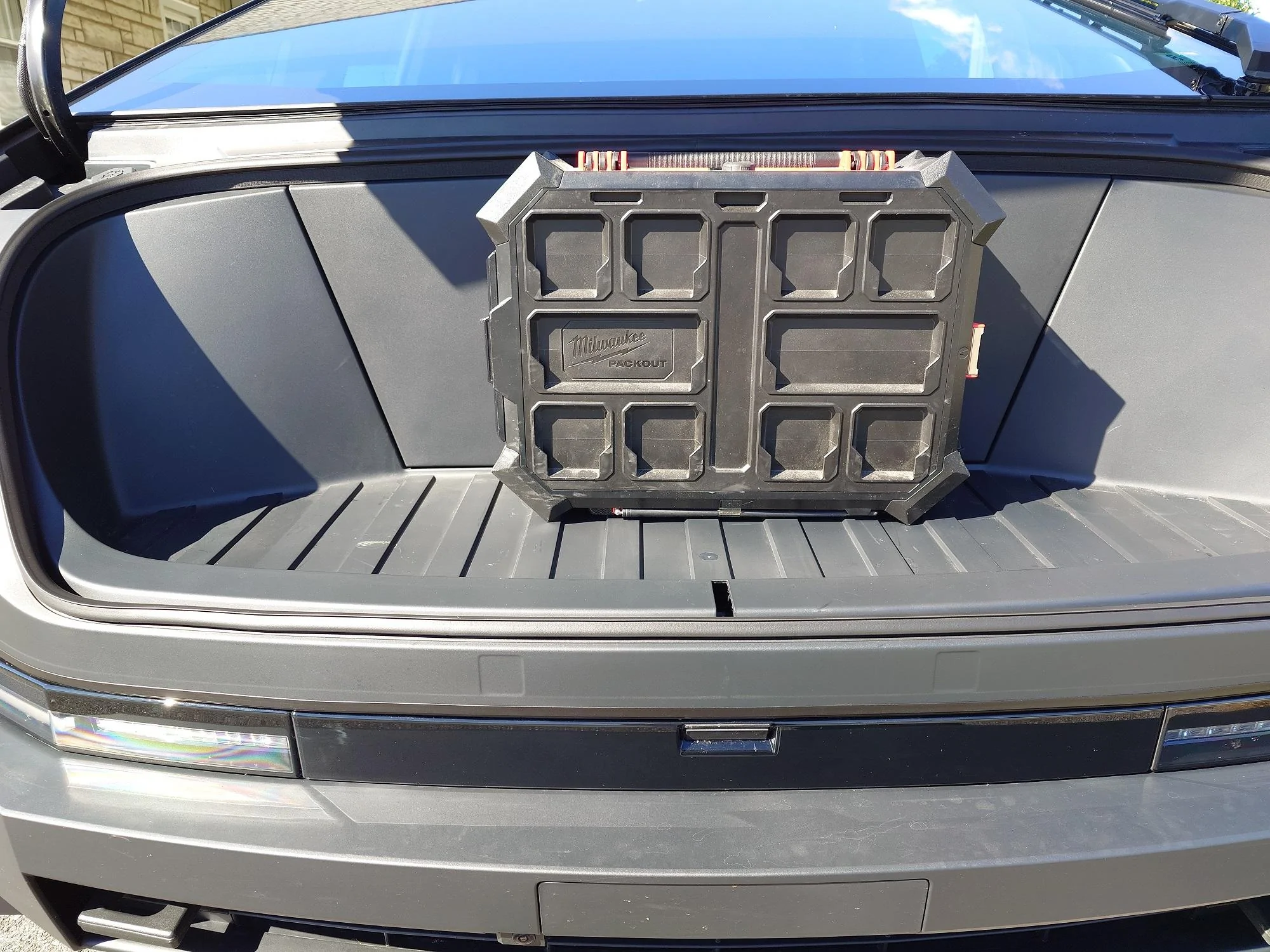 Tesla Roadster 2nd gen Party speaker in frunk -- which ones fit and can be secured with factory cargo net? cybertruck-packout2