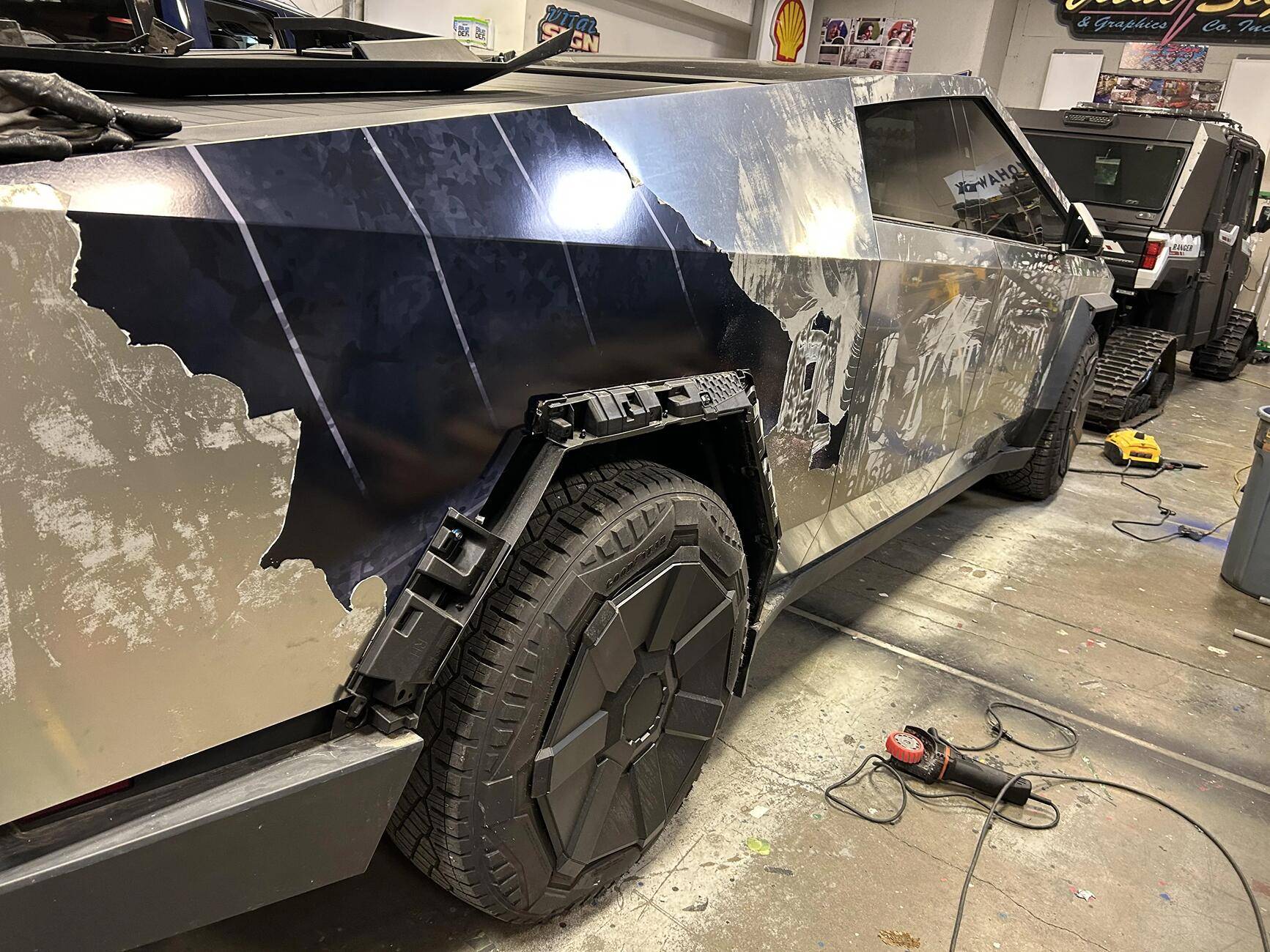 Tesla Cybertruck Liquid Interstellar Blue PPF Wrap by TWRAPS cybertruck-wrap-removal-v0-2pnh92deq8ce1