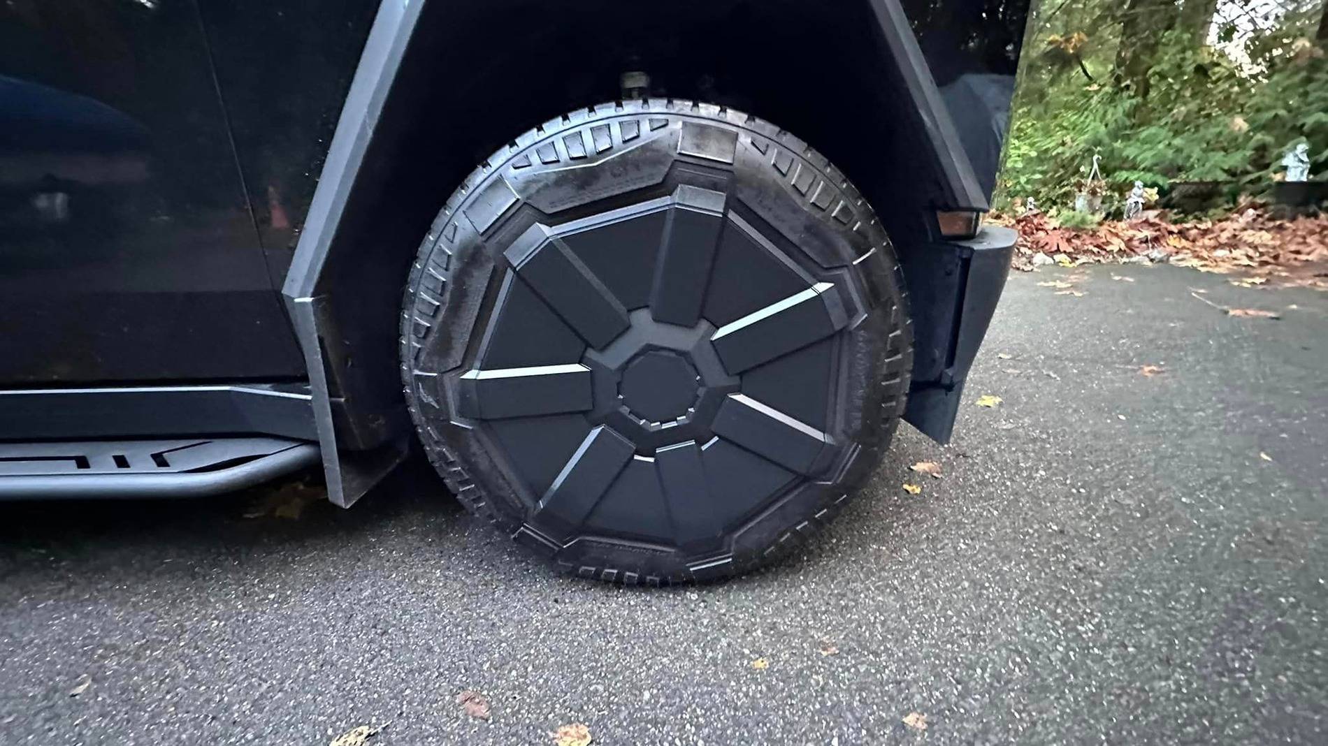Tesla Cybertruck BLACK Vinyl Wrap & PPF Cybertruck -- Photos & Videos gloss black cybertruck running boards wheel covers
