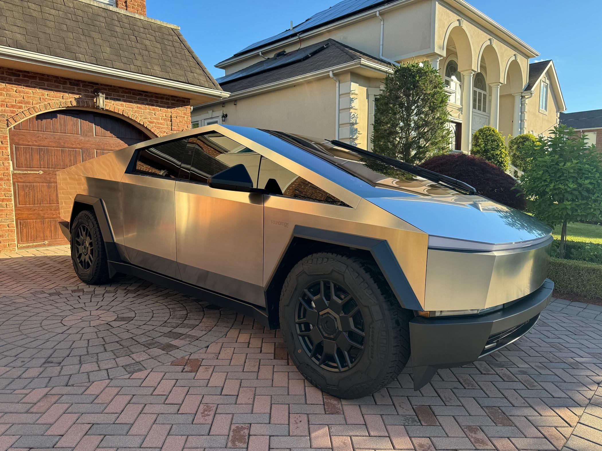 Tesla Roadster 2nd gen Cybertruckco aluminum locking wheel caps installed - review and pics IMG_0083