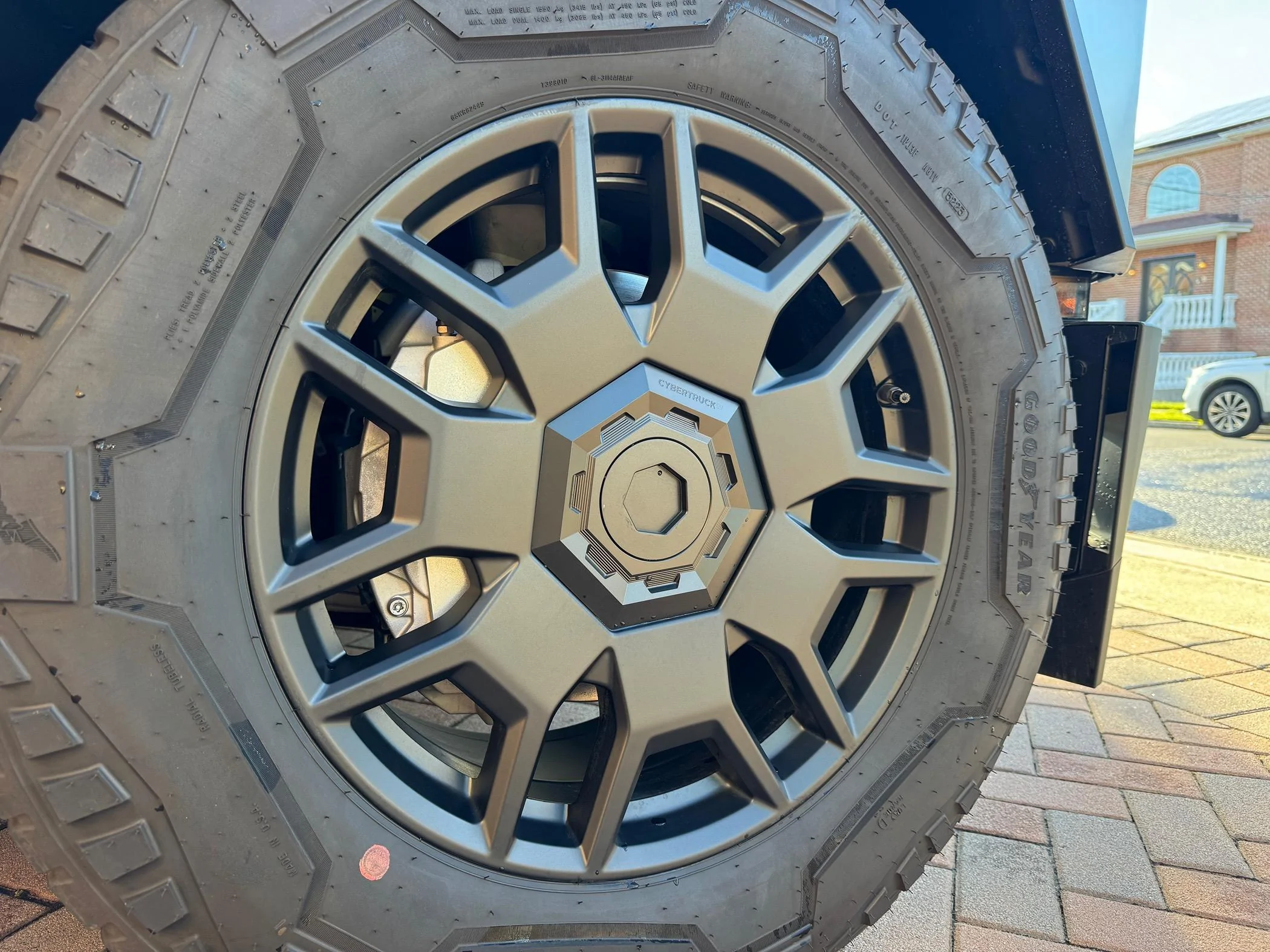 Tesla Roadster 2nd gen Cybertruckco aluminum locking wheel caps installed - review and pics IMG_0085