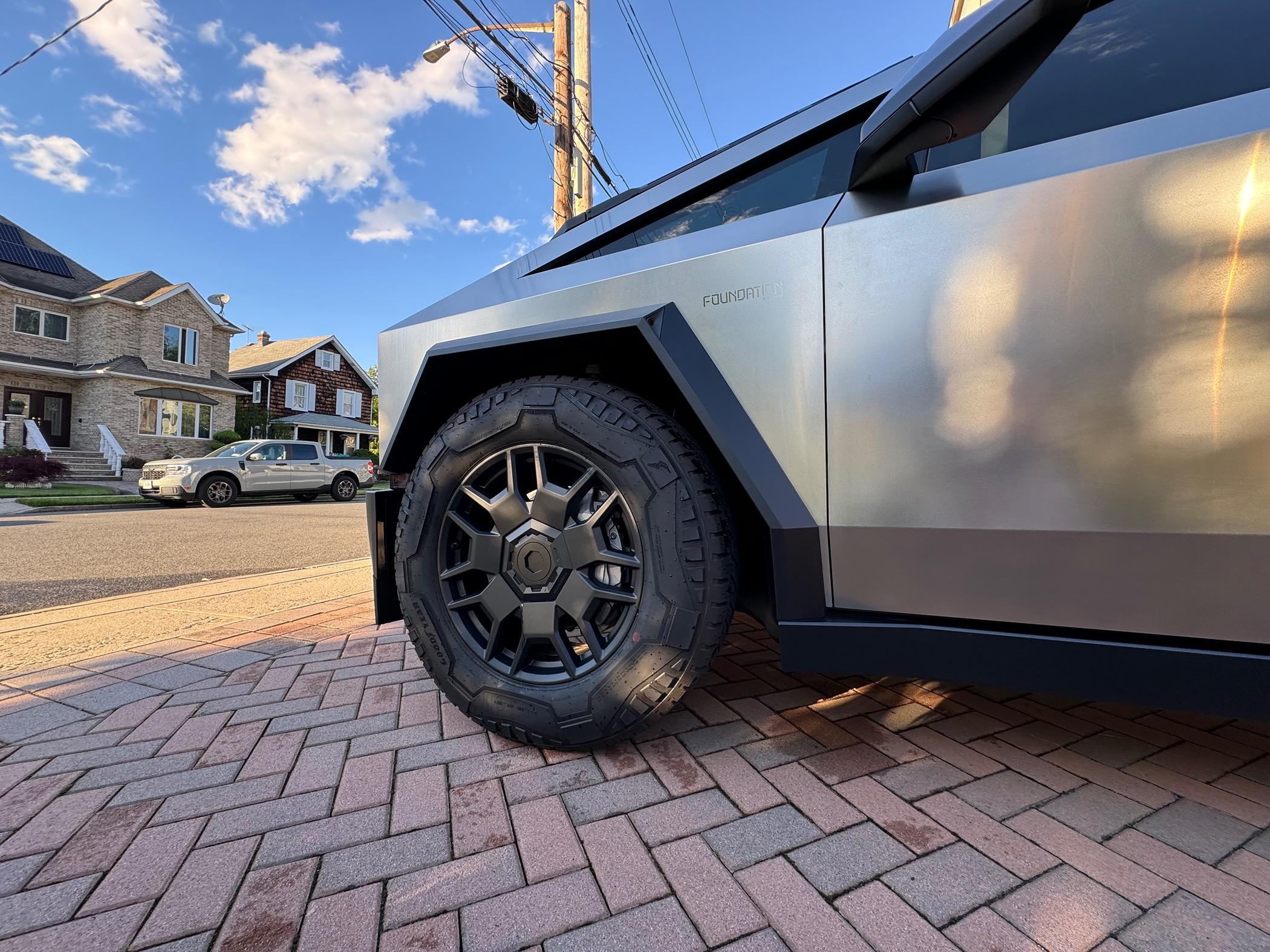 Tesla Roadster 2nd gen Cybertruckco aluminum locking wheel caps installed - review and pics IMG_0087