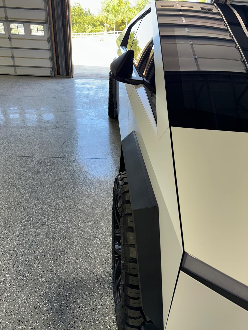 Tesla Cybertruck New Wrap (Satin White), Aftermarket Wheels, Nitto Ridge Grappler Tires, Painted Brakes Calipers w/ Cybertruck Logo IMG_0097