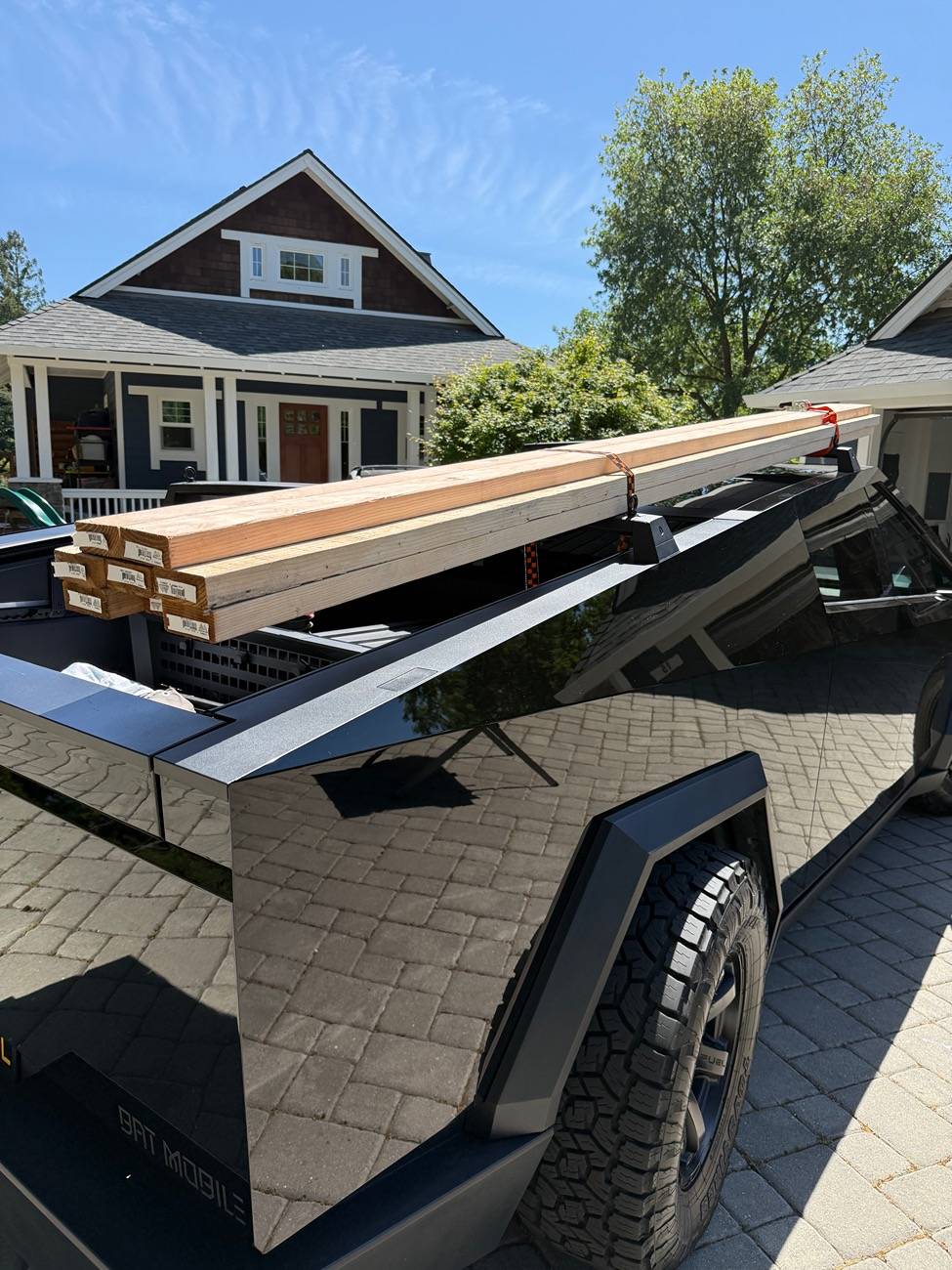 Tesla Roadster 2nd gen OEM Crossbars versus MARS Adventure Gear IMG_0176