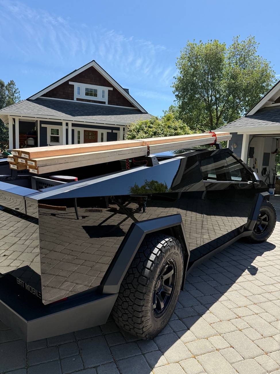 Tesla Roadster 2nd gen OEM Crossbars versus MARS Adventure Gear IMG_0177