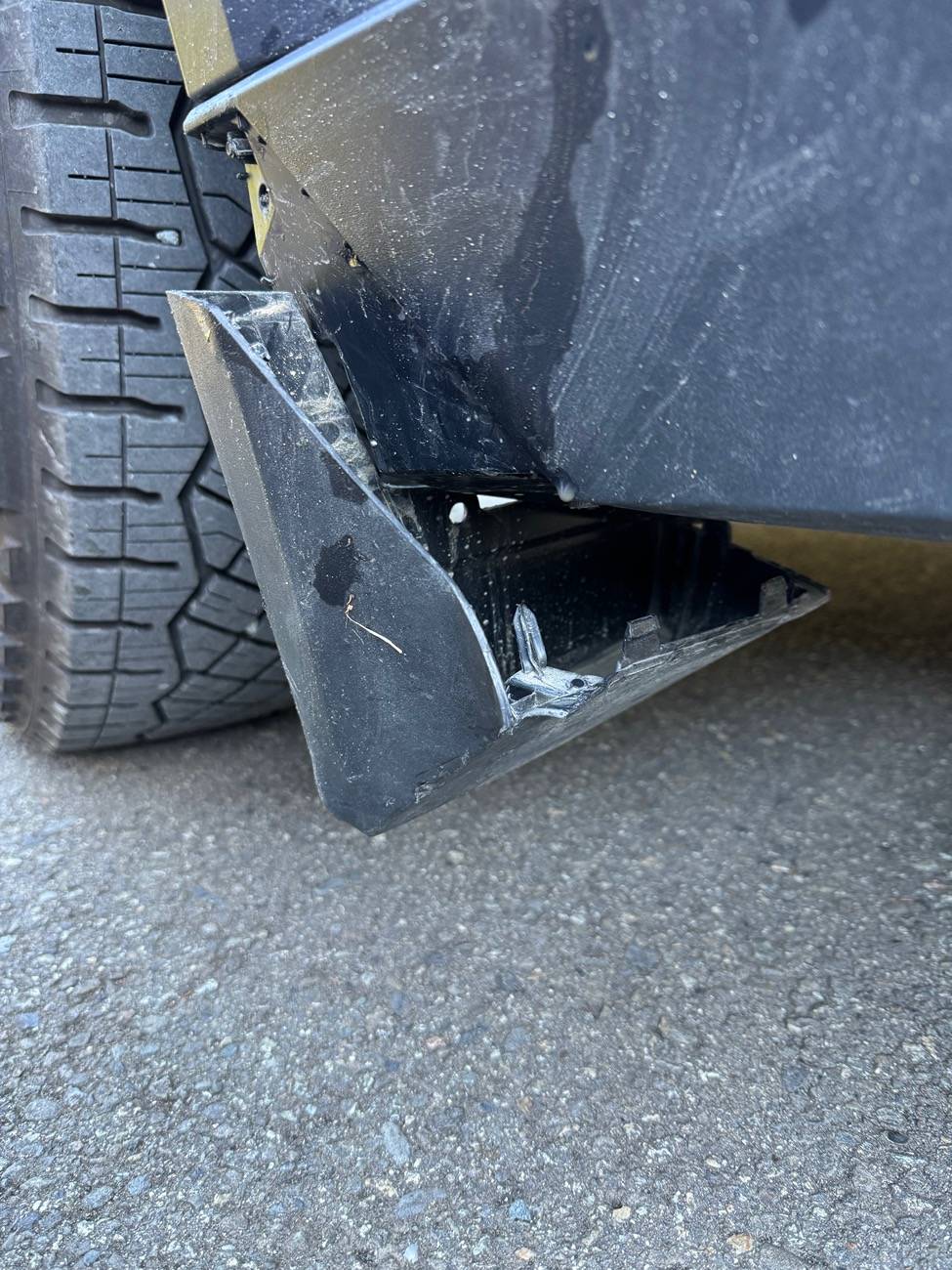 Tesla Roadster 2nd gen Road Damage to Rocker Fairing IMG_0265