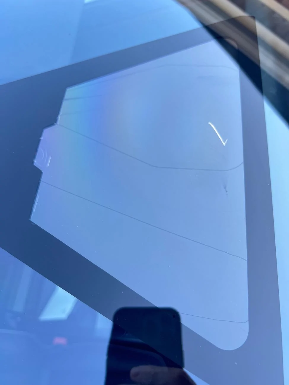 Tesla Roadster 2nd gen Leaf between window and rear view mirror cover. IMG_0454