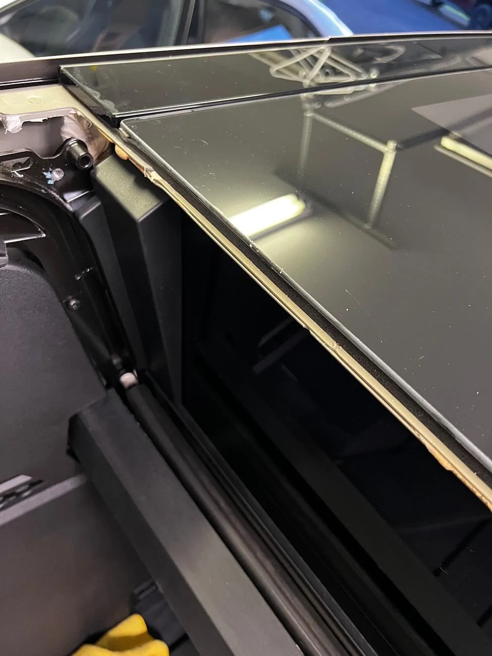 Tesla Roadster 2nd gen Tonneau cover leak DIY fix (cause: seal strip gap under aero flap) IMG_0978