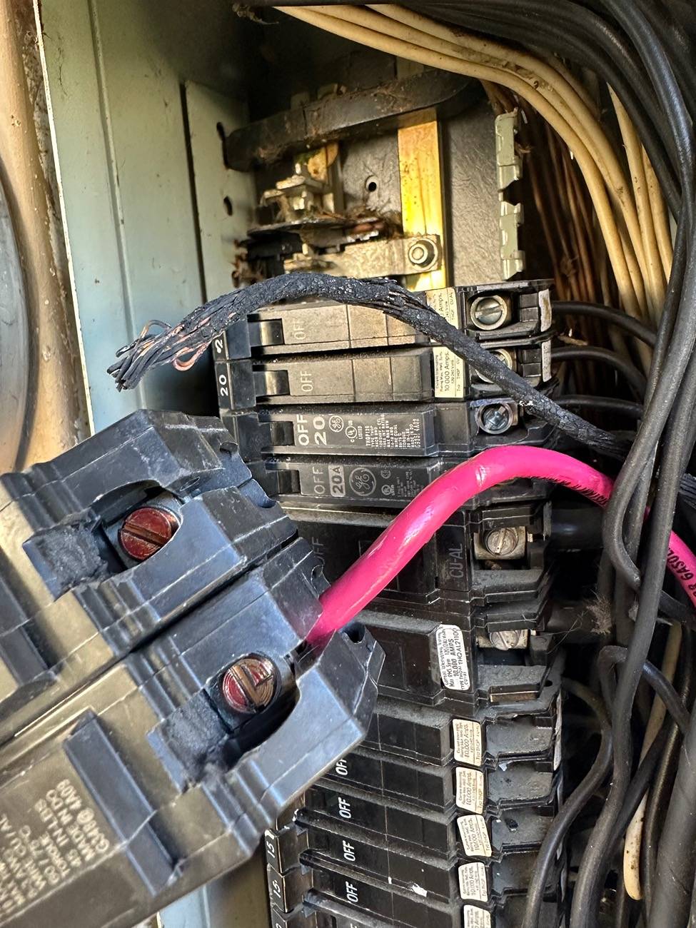 Tesla Roadster 2nd gen overloaded ? 60amp Circuit breaker melts wire IMG_1175