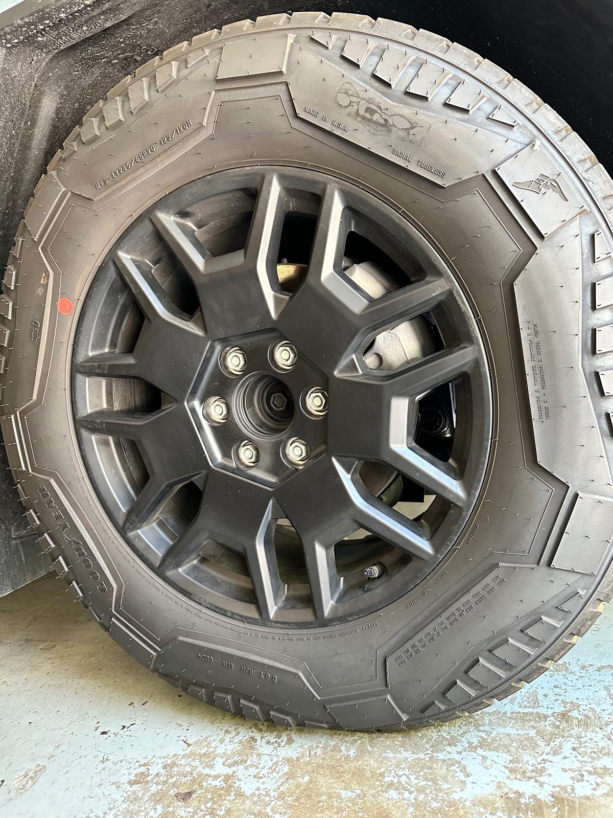 Tesla Roadster 2nd gen Cybertruckco aluminum locking wheel caps installed - review and pics IMG_1767