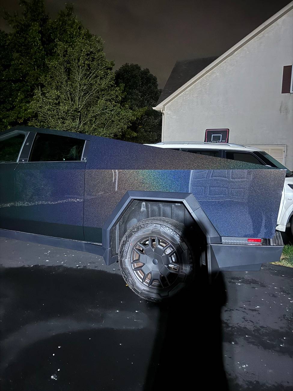 Tesla Cybertruck My DIY Cybertruck color wrap - Colorful Laser Black IMG_2030