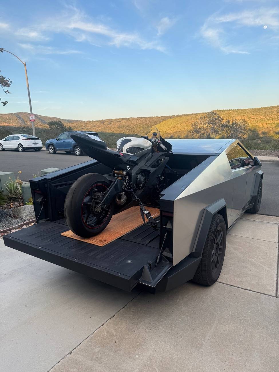 Tesla Roadster 2nd gen Ducati Panigale successfully loaded in CT! Post your motorcycles in bed IMG_2906