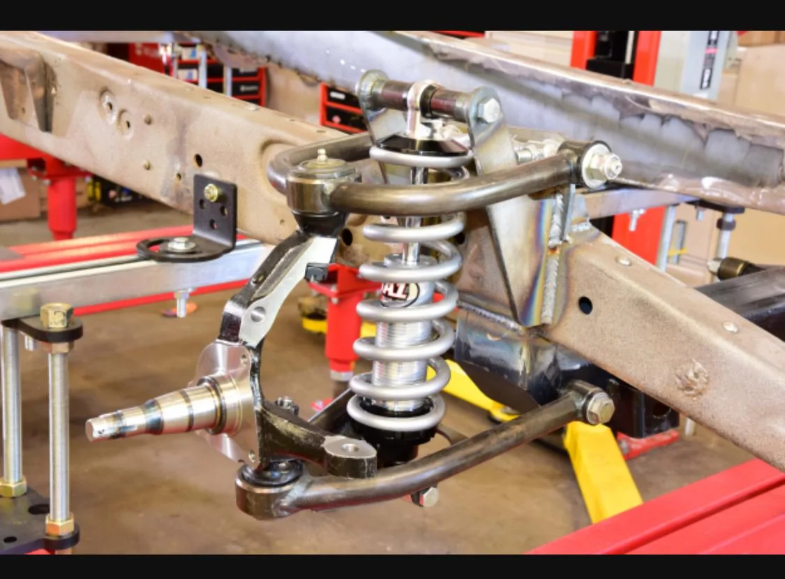 Tesla Roadster 2nd gen Cybertruck engineers bend upper control arm in testing IMG_3110