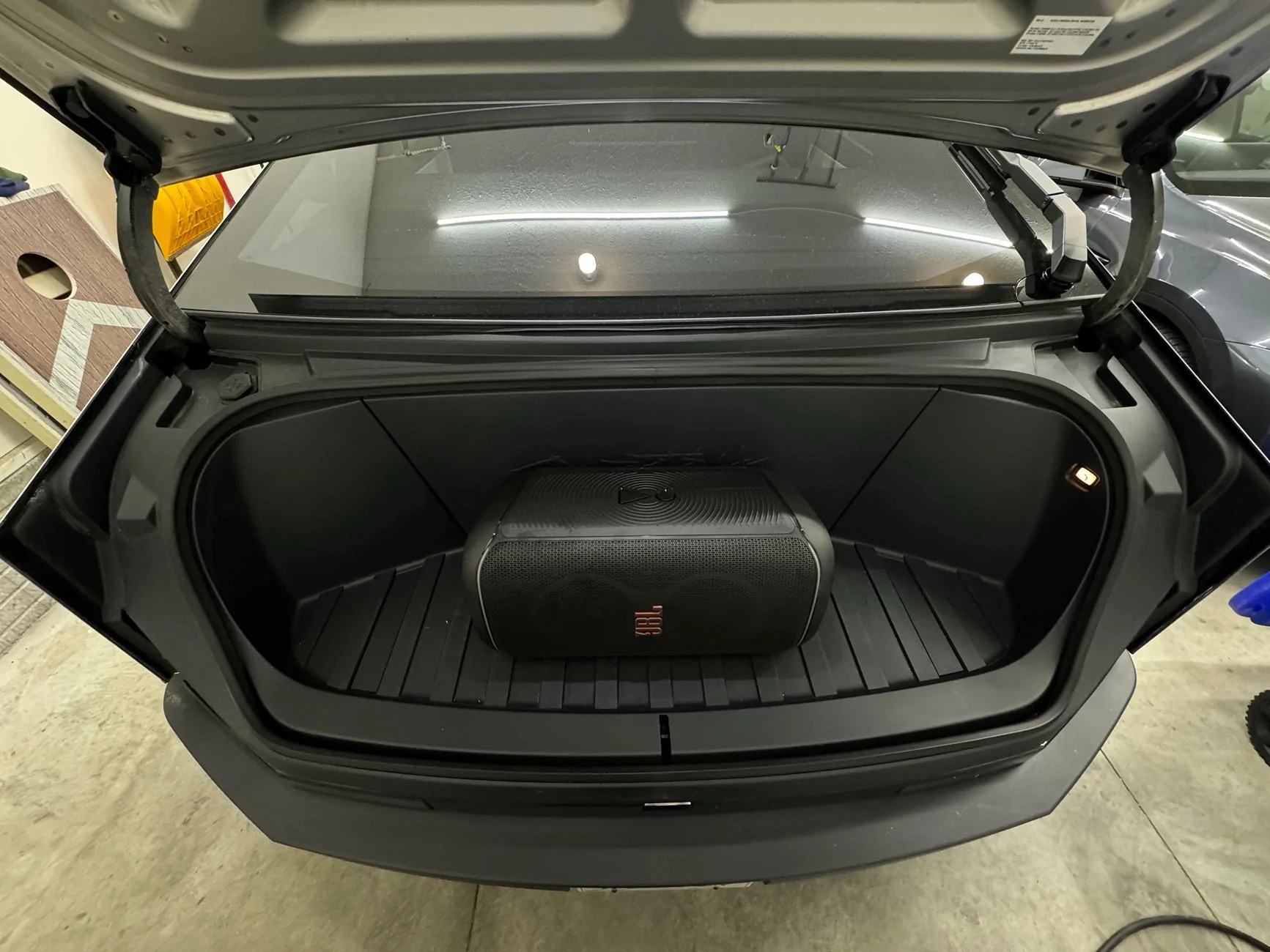Tesla Roadster 2nd gen Party speaker in frunk -- which ones fit and can be secured with factory cargo net? IMG_3522