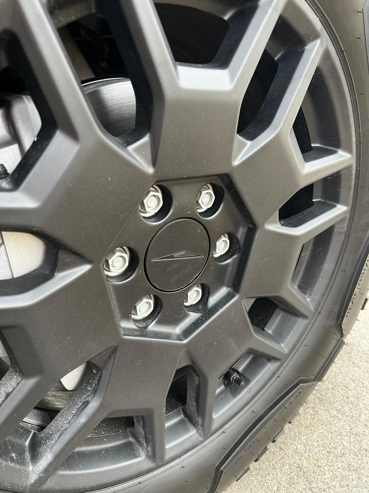 Tesla Roadster 2nd gen Rust in center of wheel hub? IMG_4251