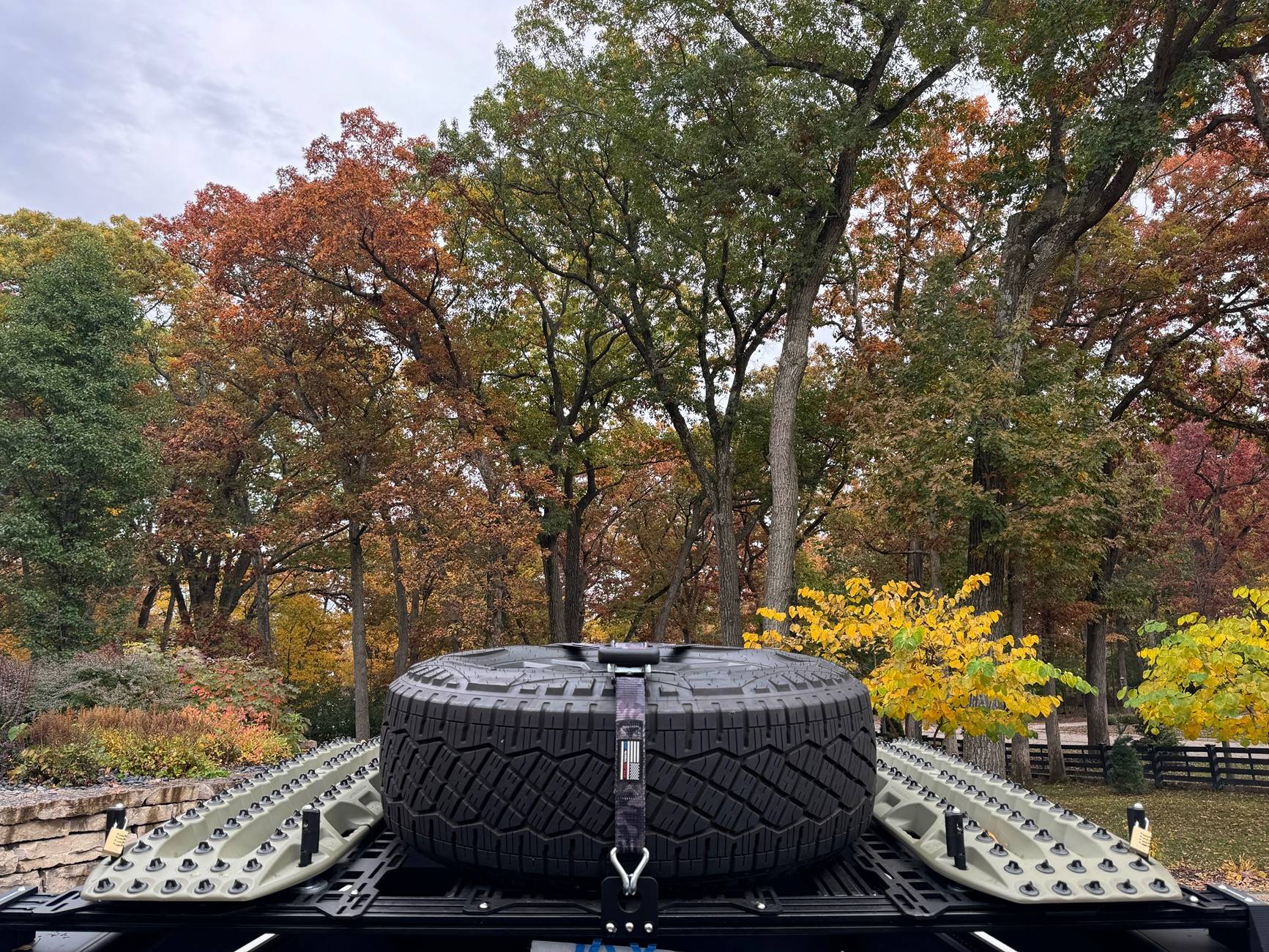 Tesla Roadster 2nd gen Customized roof rack installed with unique spare tire placement IMG_4637