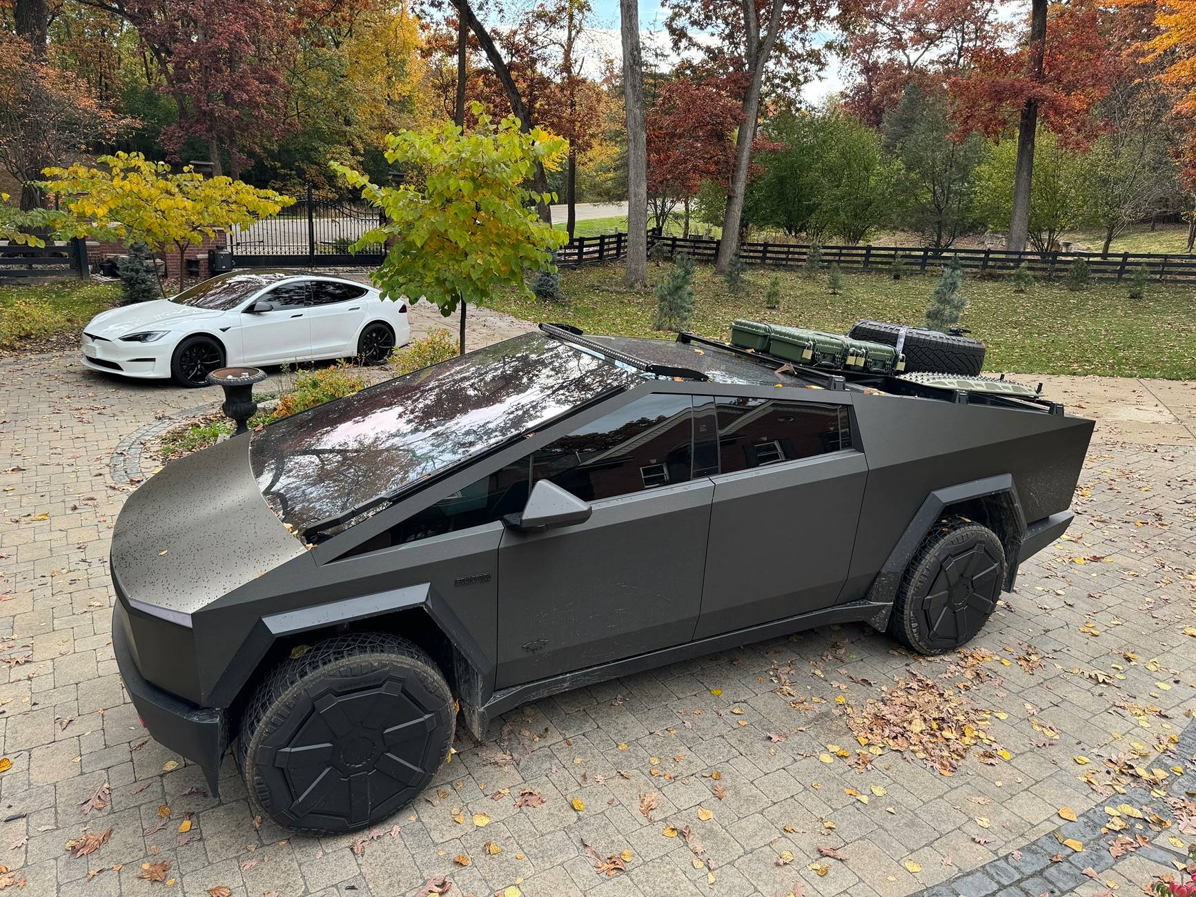 Tesla Roadster 2nd gen Customized roof rack installed with unique spare tire placement IMG_4639