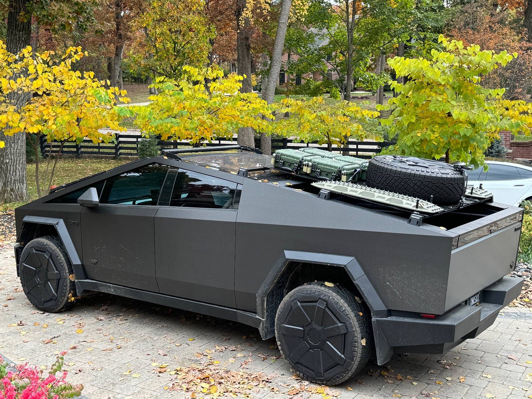 Tesla Roadster 2nd gen Customized roof rack installed with unique spare tire placement IMG_4640