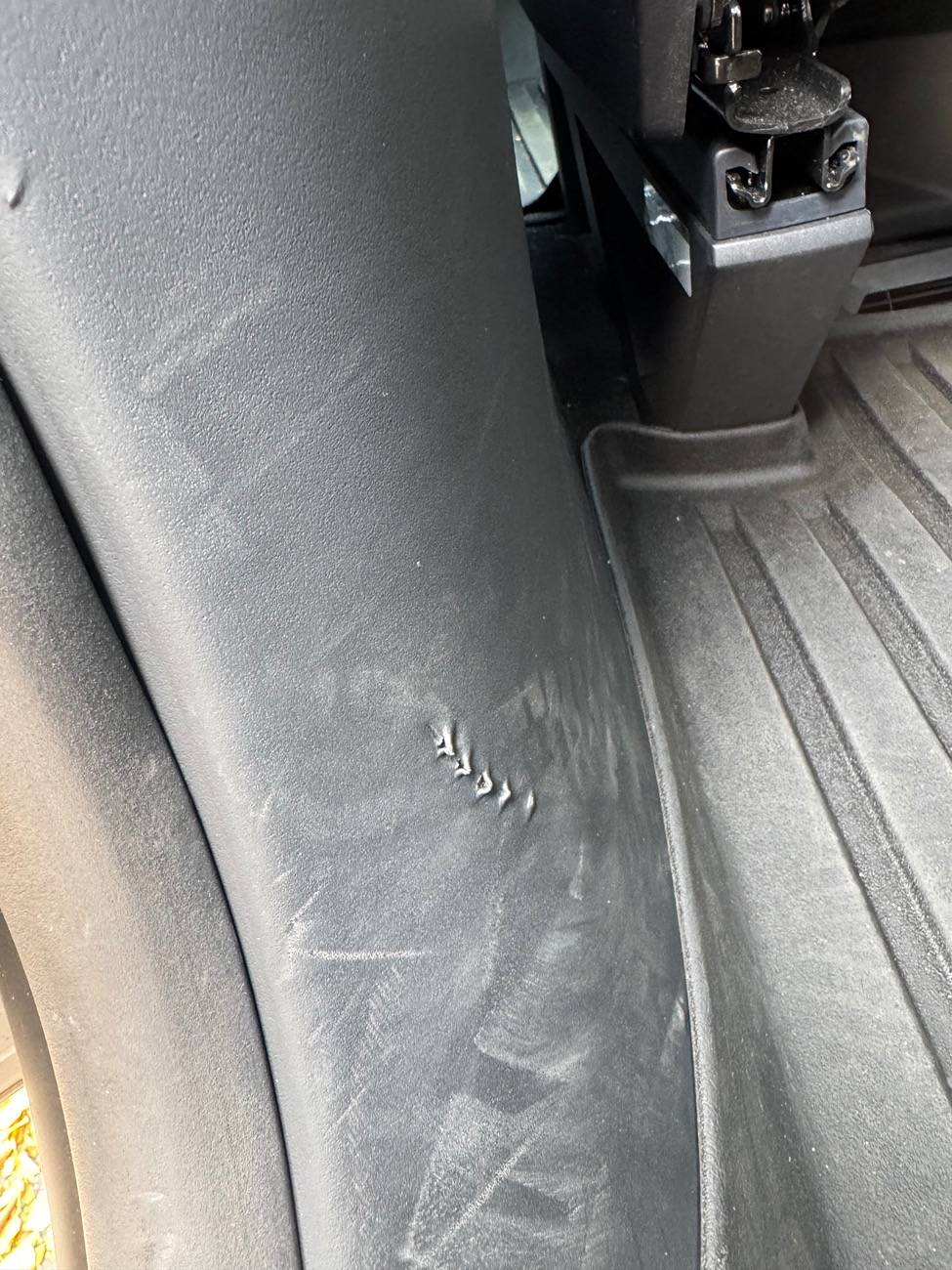 Tesla Roadster 2nd gen Interior damage - staples marks IMG_4648