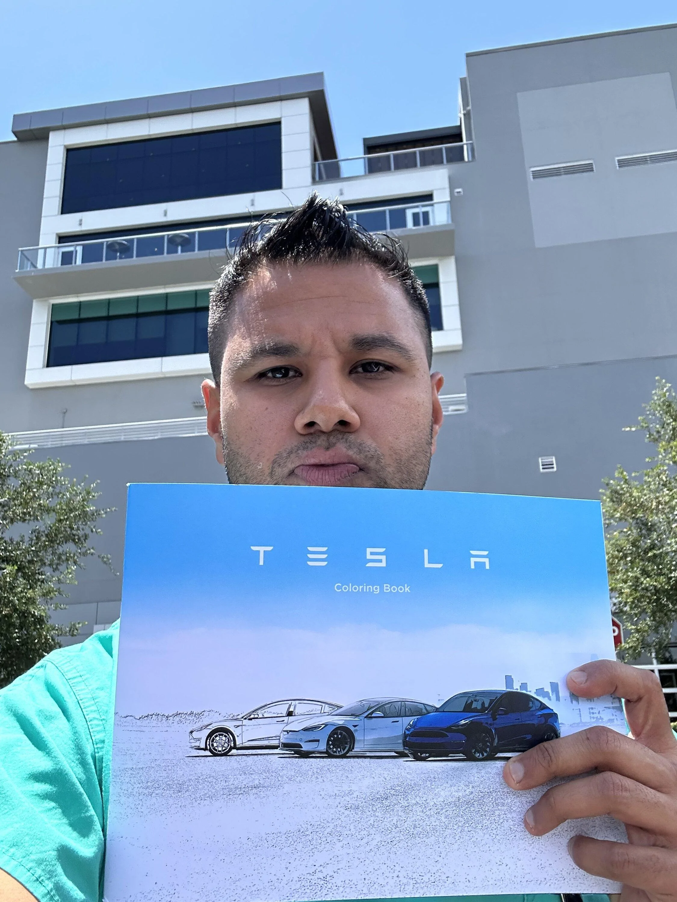 Tesla Roadster 2nd gen Cybertruck V2V Bidirectional Charging Confirmed in new Tesla service center coloring books? IMG_4731