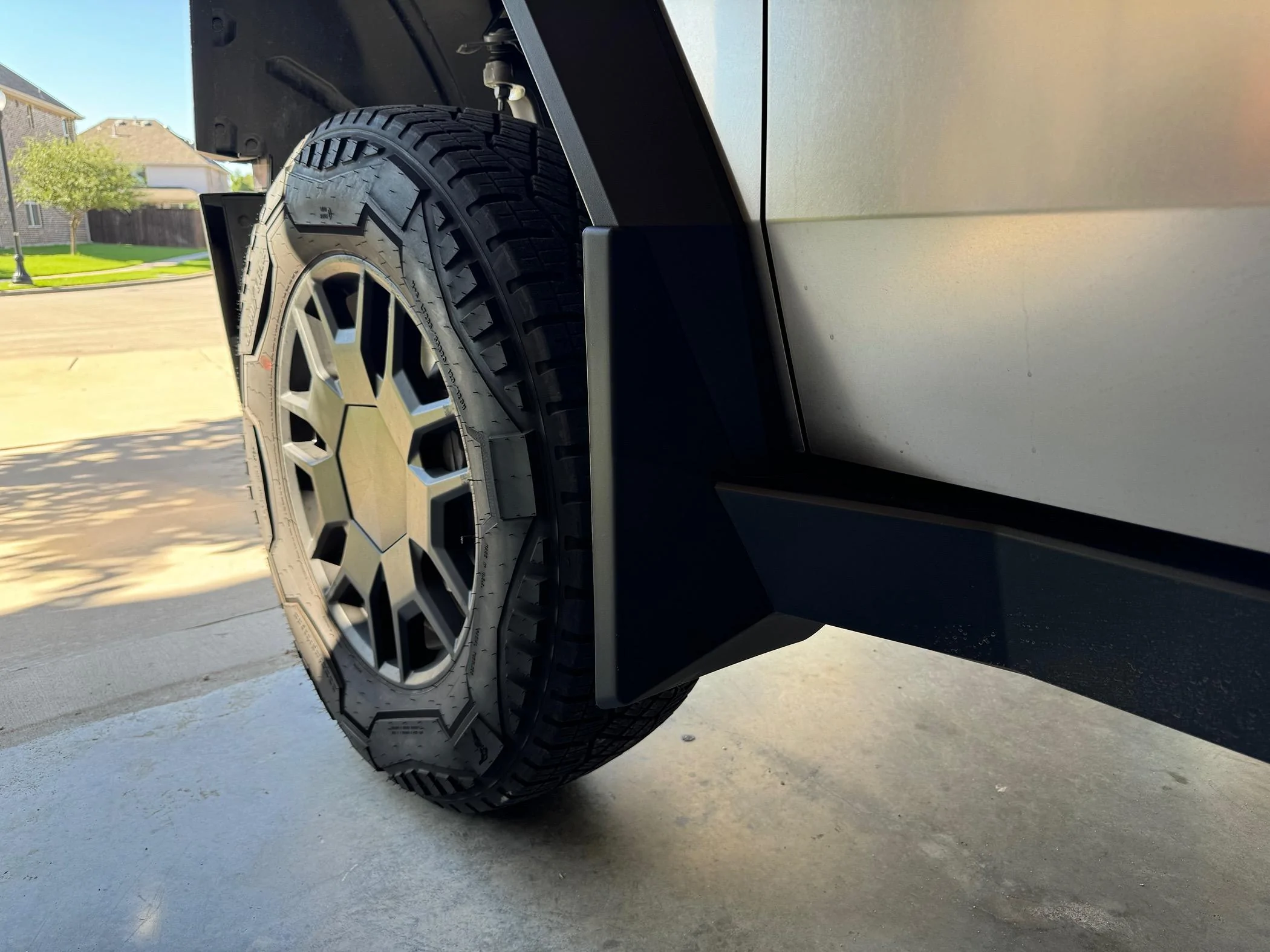 Tesla Roadster 2nd gen Installed Mud Flaps from EVVida/BestEvMod IMG_6508