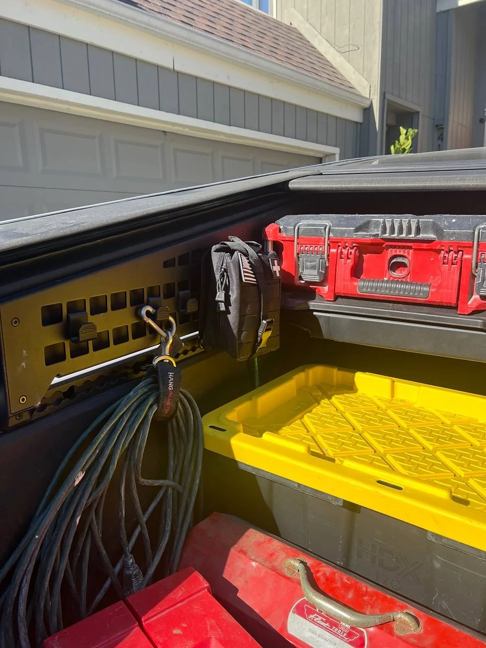 Tesla Cybertruck Please share what you put on your MOLLE Panels and your organization tips! IMG_6521