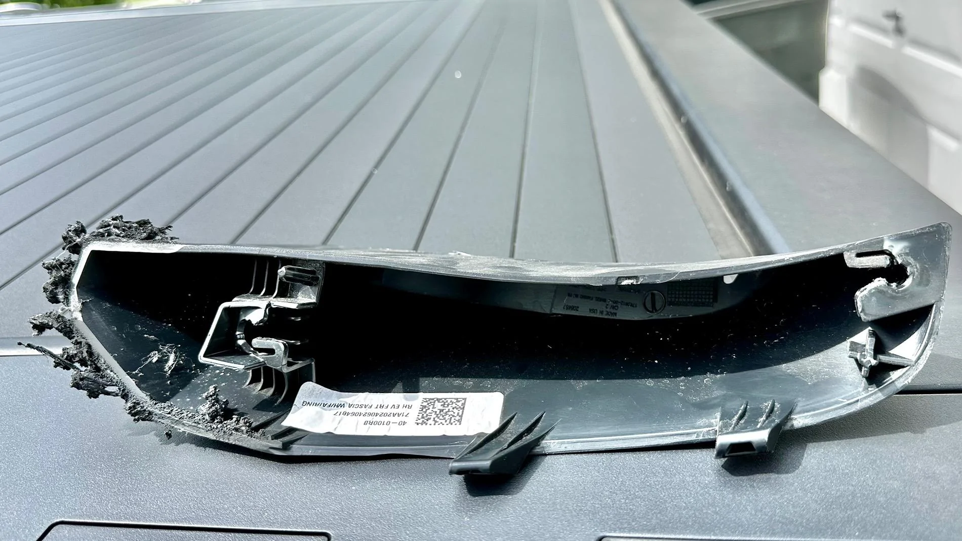 Tesla Roadster 2nd gen Front trim fell off IMG_6996