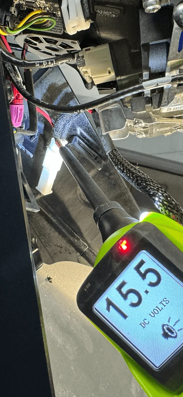 Tesla Cybertruck Installing a 12 volt radar detector -- use 12 - 15 volt circuit behind the rear view mirror compartment. IMG_7021
