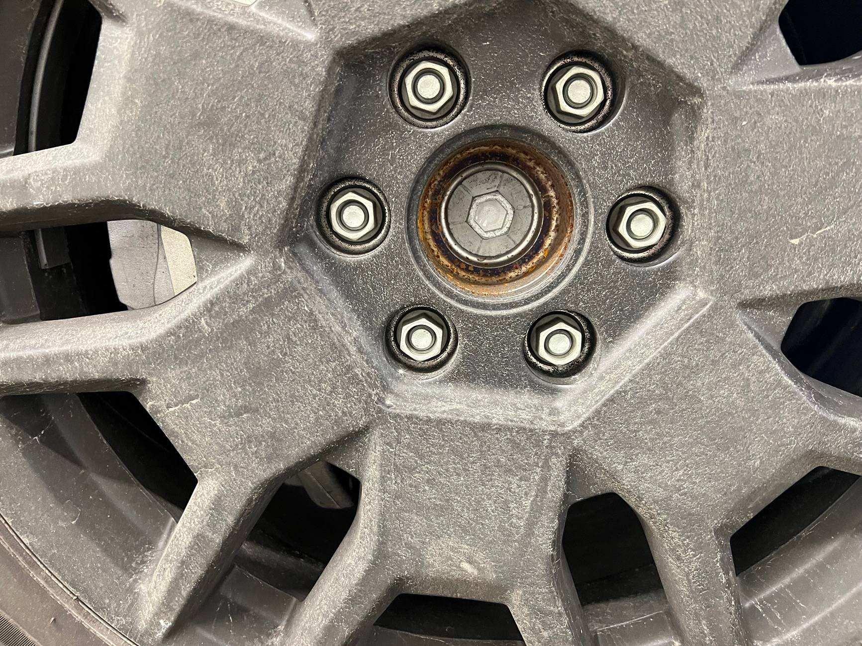 Tesla Roadster 2nd gen Rust in the centers of all four wheels. IMG_7113