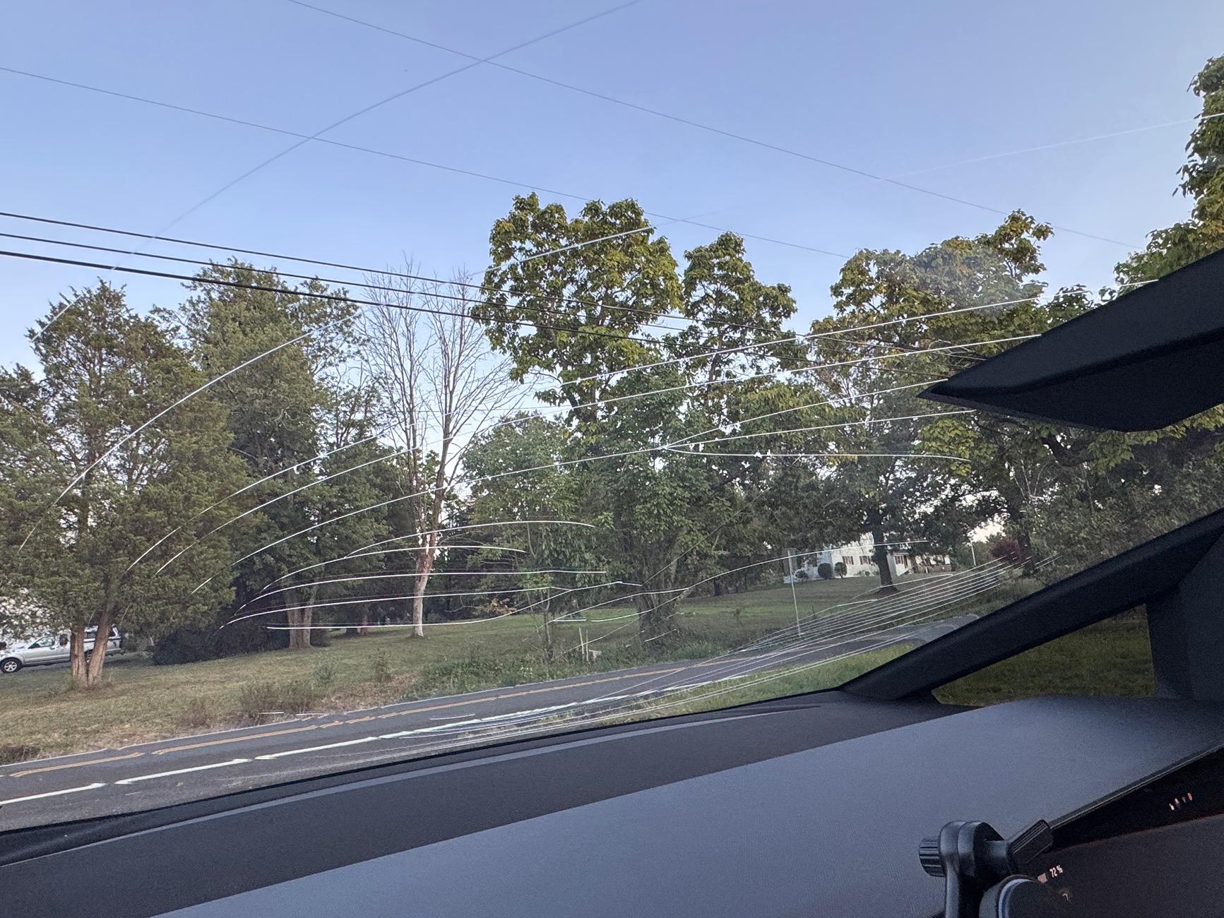 Tesla Roadster 2nd gen Windshield shattered while cleaning IMG_7308