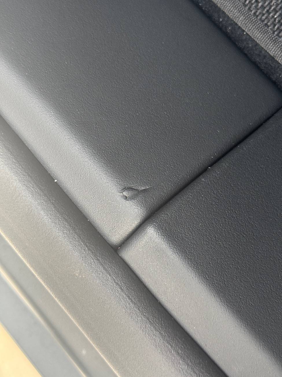 Tesla Roadster 2nd gen Interior damage - staples marks IMG_8305