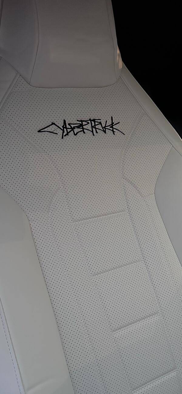 Tesla Cybertruck Aftermarket white leather seat covers from EVBASE -- installed review & photos IMG_9143