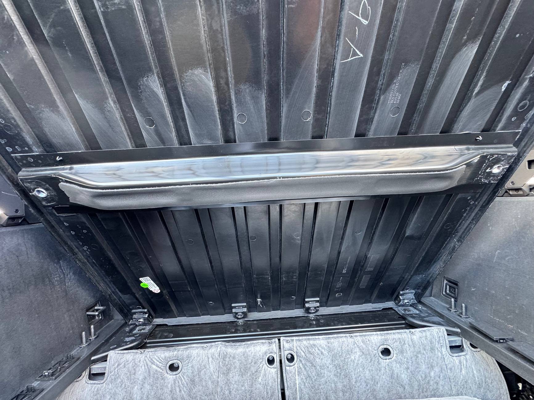 Tesla Cybertruck UPDATED - Air suspension compressor loose AF IMG_9488