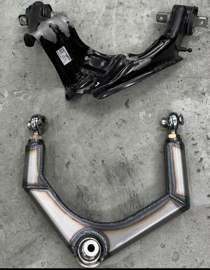 Tesla Roadster 2nd gen Cybertruck engineers bend upper control arm in testing m3TPlJS