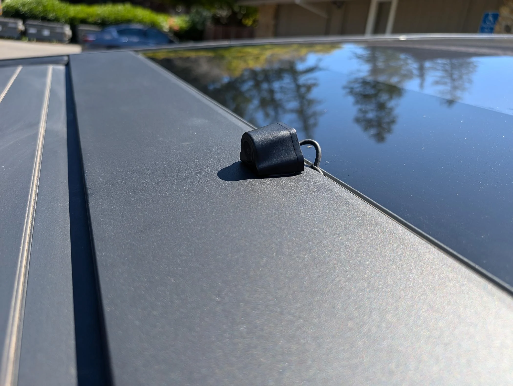 Tesla Roadster 2nd gen Digital Rear View Mirror Installed - WOLFBOX 12" Rear View Mirror Camera ... cheap and it works PXL_20240615_224128079