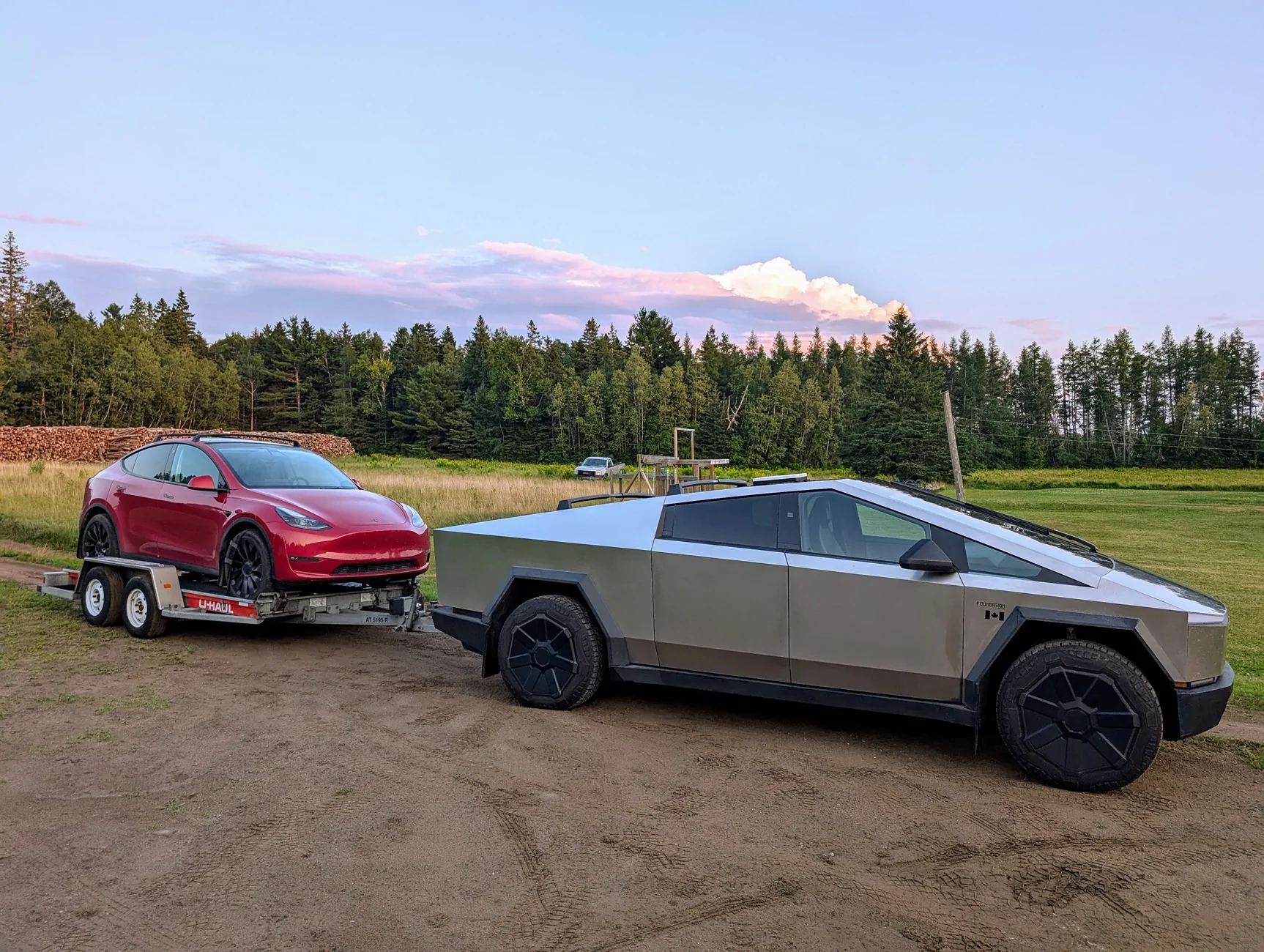 Tesla Cybertruck Cybertruck and U-Haul Car Hauler Towing MYP PXL_20250729_233915150~2