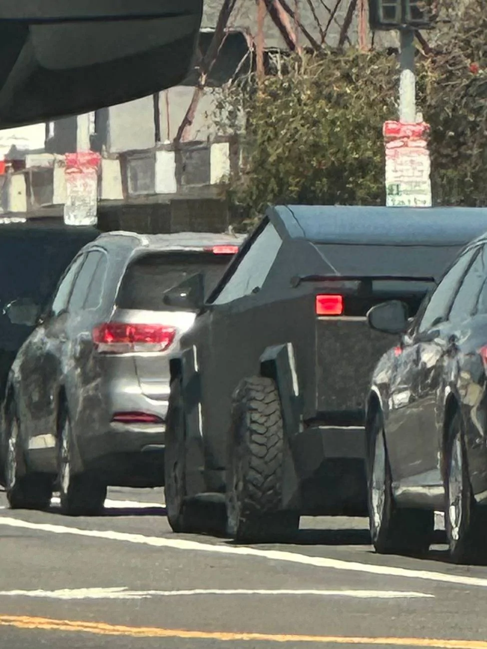 Tesla Cybertruck Rear Spoiler Aftermarket Options? rear-spoiler-on-a-cybertruck-2-jpeg