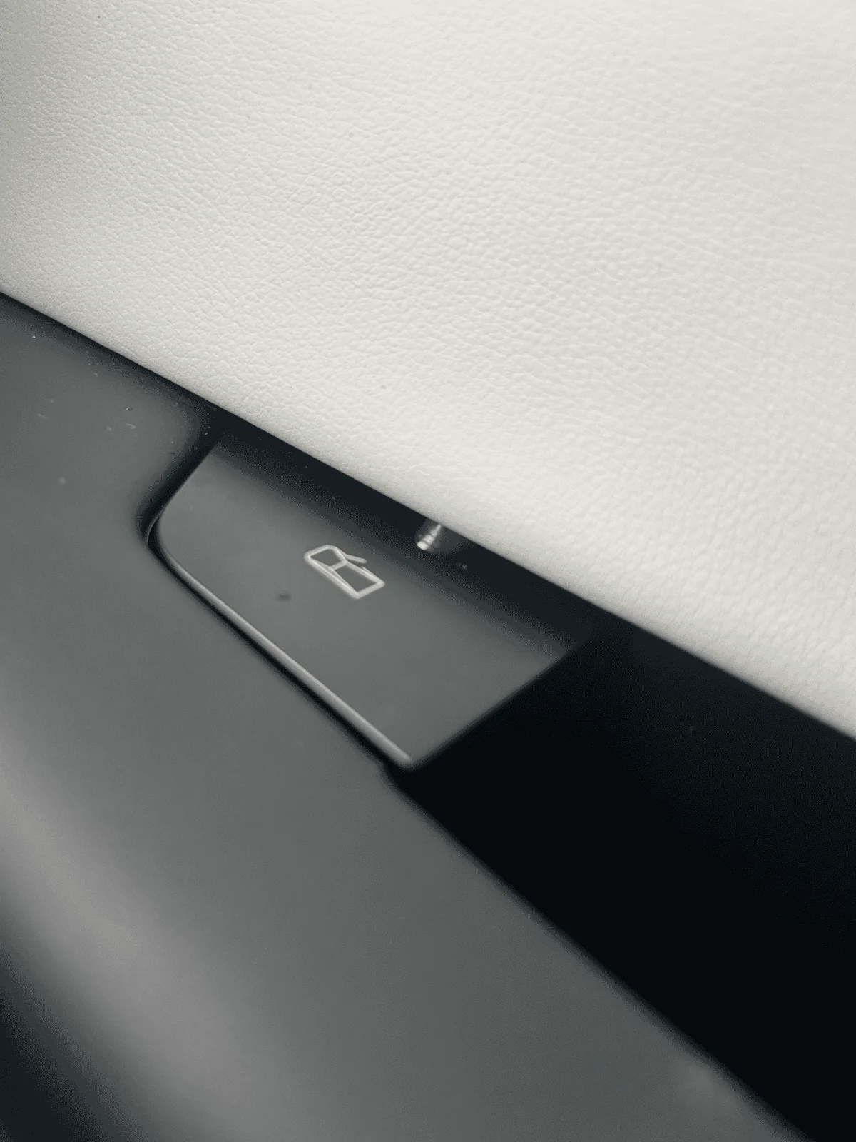 Tesla Roadster 2nd gen Mysterious glue like substance by door release button tempImagelaFErB