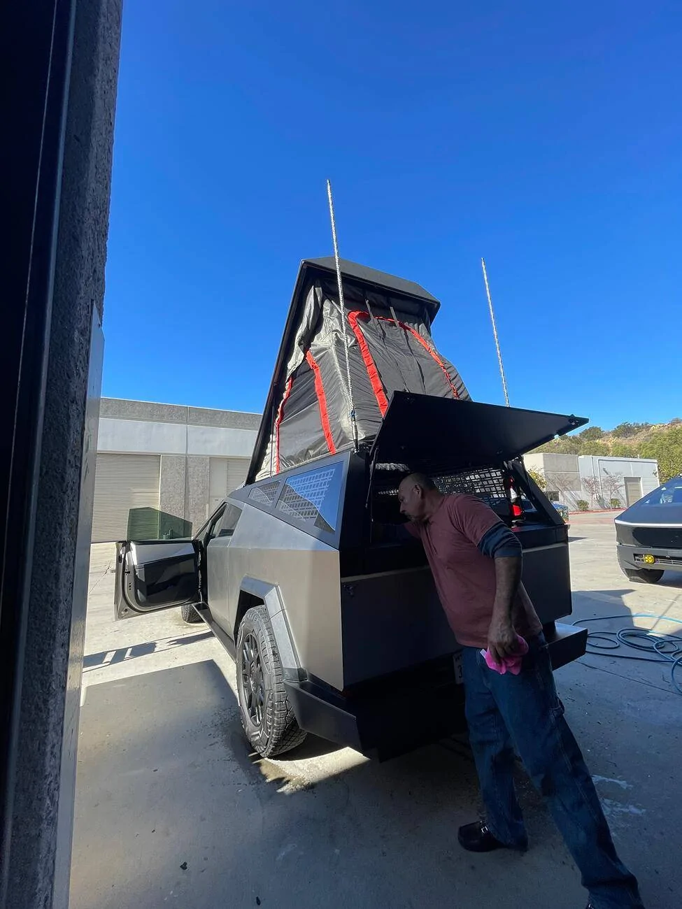 Tesla Cybertruck CYBERTRUCKco CyberCamper build on display at LA Auto show this weekend!, let us know what you think! tempImagez439l3