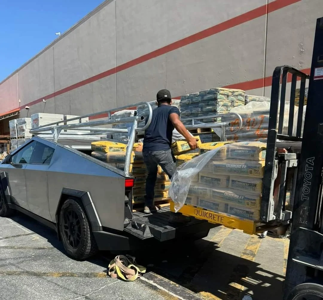 Tesla Cybertruck work truck w: custom Pipe Rack - Ladder Rack 4.jpg