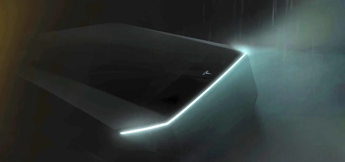 Tesla Cybertruck Did anyone notice that the original cybertruck tease was different from the actual truck? Tesla-pickup-truck-teaser-2